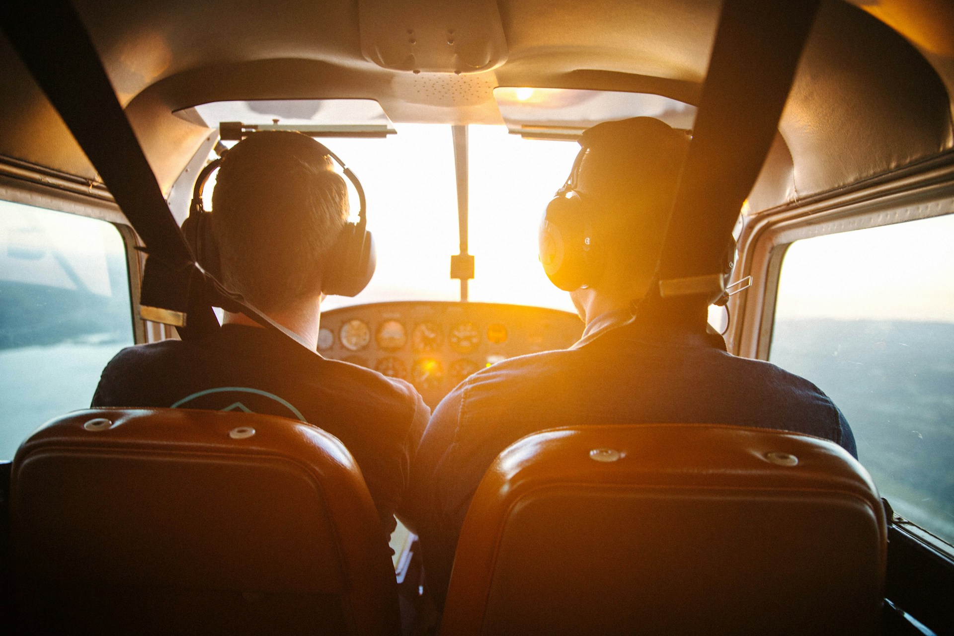 two men piloting a plane