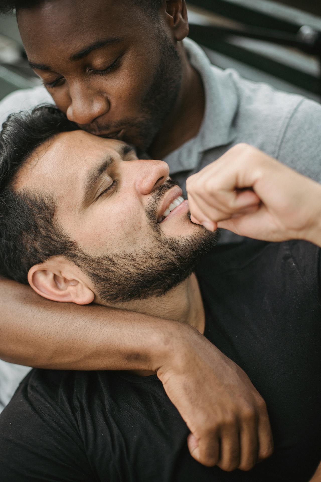 Gay couple kissing