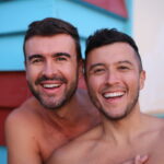 shirtless gay couple on vacation